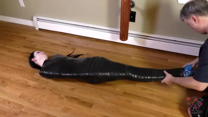 Wrapped in Desire – Raven’s Vinyl Bondage Journey