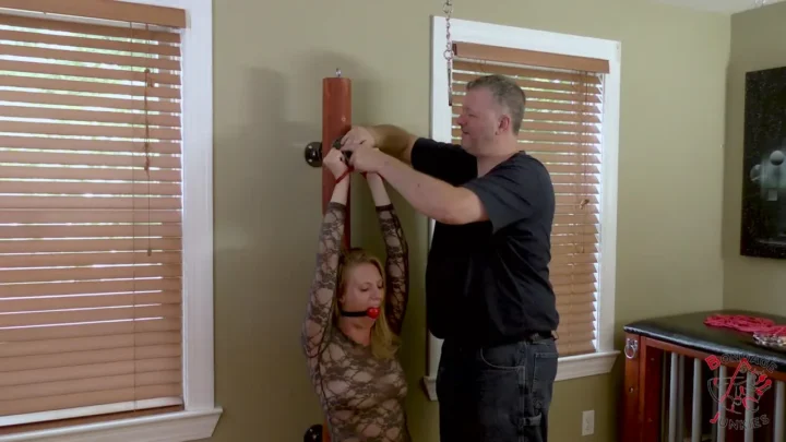 Bound Beauty – Summer’s Enthralling Encounter with Handcuffs