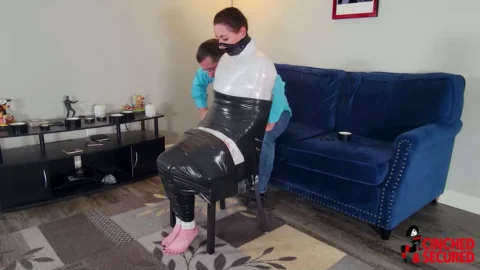 Bound to Submission Cincheds Unrelenting Plastic Wrap and Tape Ordeal