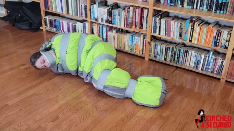 Bound and at Mercy – The Unyielding Struggle of a Woman Trapped in a Rest Sack by Her Captor