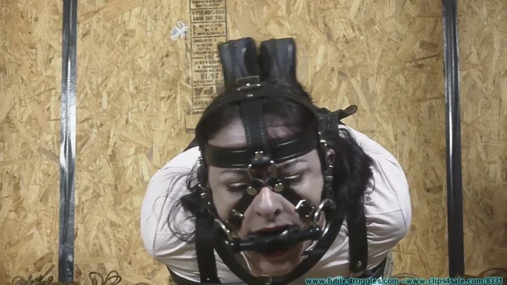 Caroline Pierce Gagged with a Rubber Bit Gag and Tongue Port