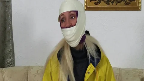 Raincoat and Restraints – Amanda’s Unexpected Journey