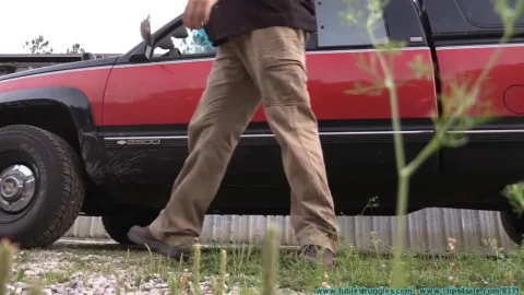 Blindfolded Ellen Chained to the Truck Hood Outdoors