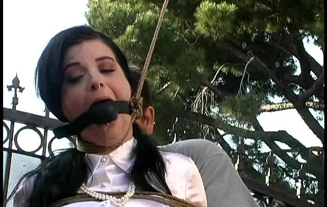 Sybil Hawthorne Gagged and Leashed for Outdoor Exercise in Yard