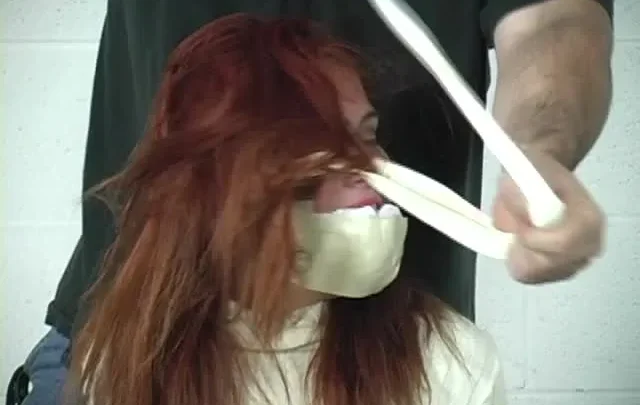 Ashley Grahams Wrists Pulled High in Torment Session