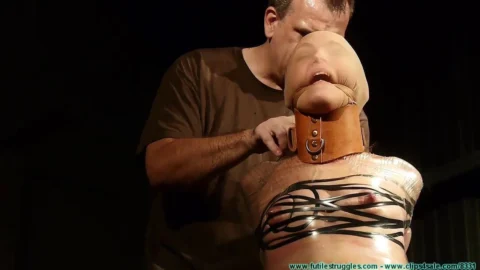 Pantyhose Cleave Gag and Posture Collar Enhance Rachels Tape Bondage