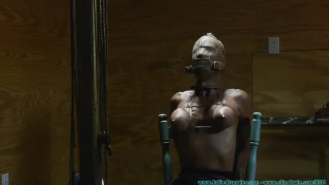 Amanda Foxx Hooded and Chairtied in Garter and Stockings