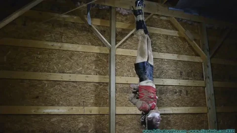 Leather Hooded Girl Hanging in Red