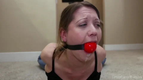 Chrissy Maries Bound Beauty – A Ballgag Spectacle in Blue Jeans
