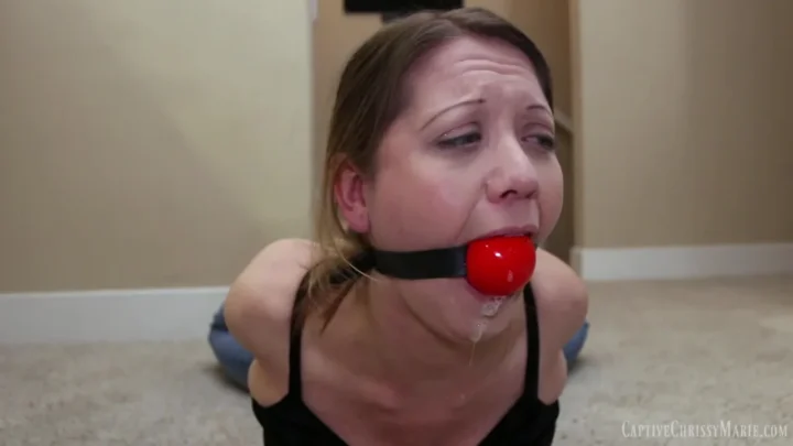 Chrissy Maries Bound Beauty – A Ballgag Spectacle in Blue Jeans
