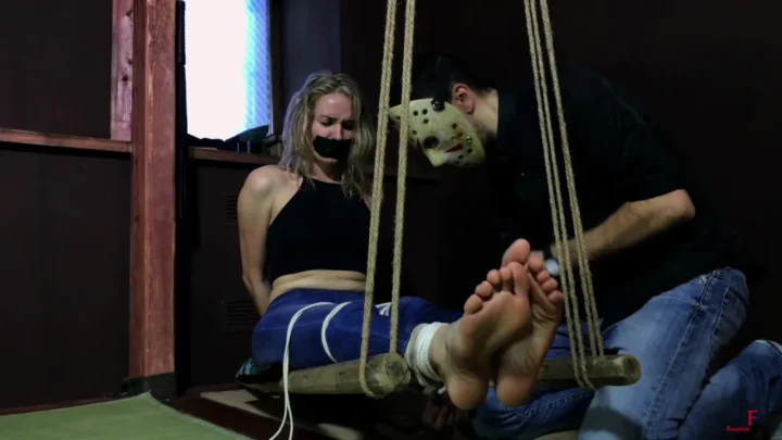 Esenya Endures Focused Foot Play in Bondage