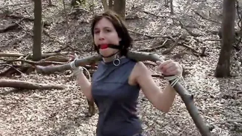 Gina Feels Nature in Tight Forest Restraint