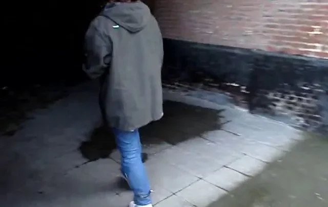 Brunette Pausing by Doorways in Old Stable Site