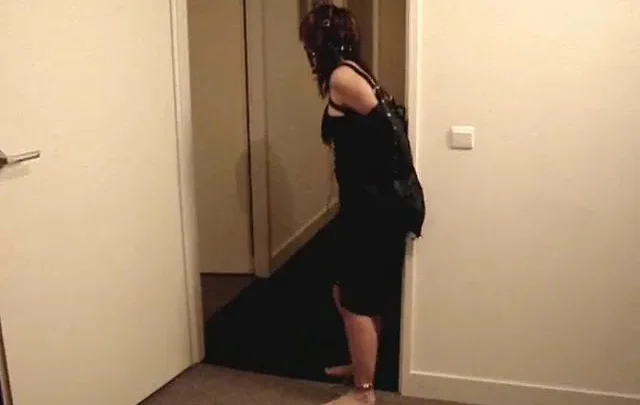 Dim Hallway Tests Armbinder and Gag Fit